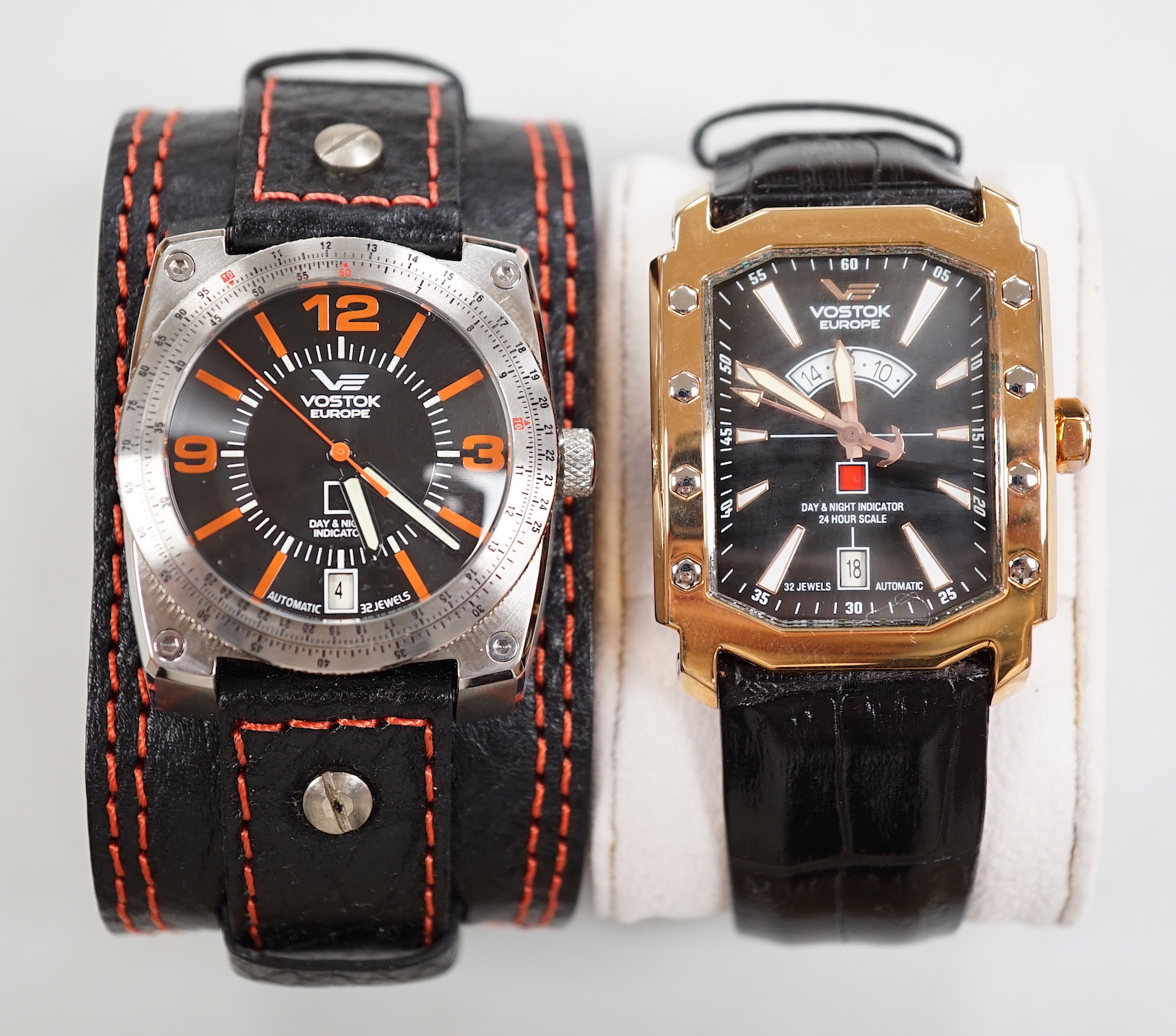 Two gentleman's modern Vostok Europe gilt or stainless steel wrist watches, Arktika and Lunokhod, both with day/night indicators.